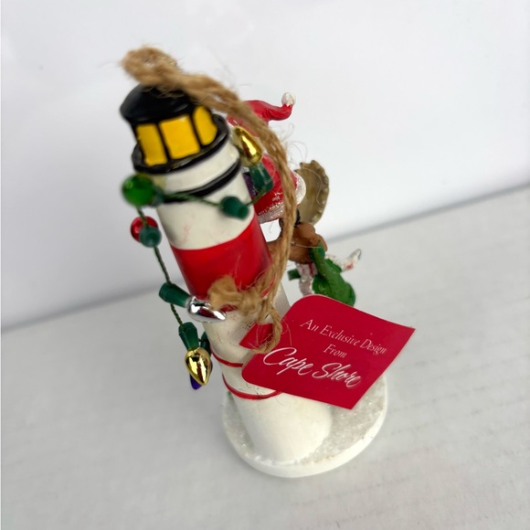 Santa & Moose Decorating a Lighthouse Christmas Ornament Julia Oliver Cape Shore - Picture 3 of 6